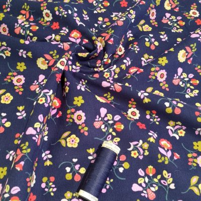 Navy and bright floral print 21 wale needlecord